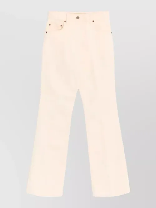 Valentino Garavani - flared denim trousers featuring pockets and loop