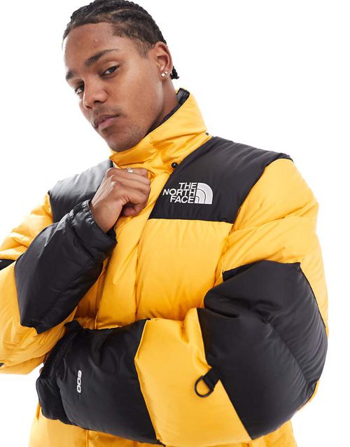 Himalayan baltoro puffer jacket in black and yellow