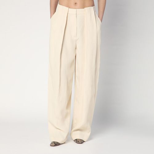 Wide butter-coloured pants in linen blend