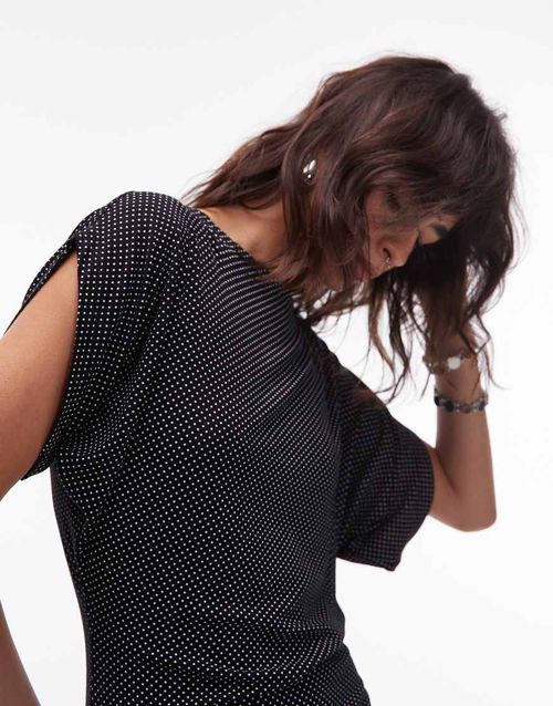 Polka dot slash neck batwing top in black