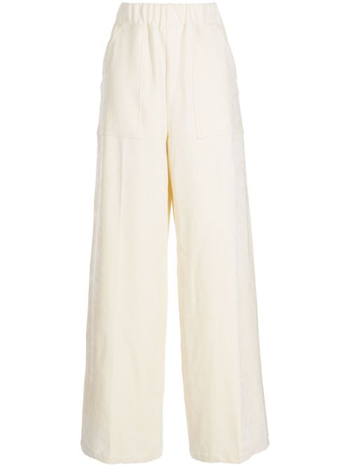 Elasticated-waistband velvet-finish flared trousers - White