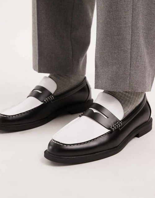 Penny loafers in black and white