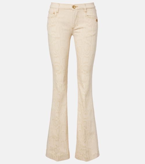 Snake-print flared jeans