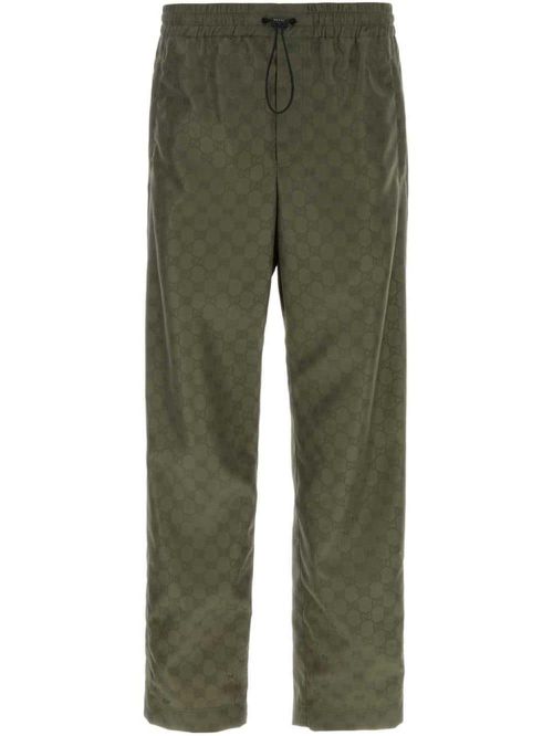All-over logo-print trousers - Green