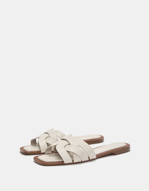 Flat crossover slider sandals in ecru-White