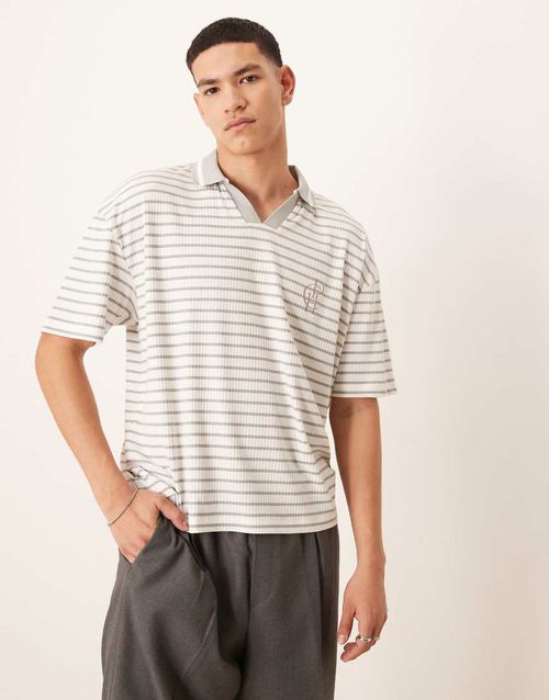 ASOS DESIGN boxy oversized polo with chest logo in blue and white ribbed stripe-Multi