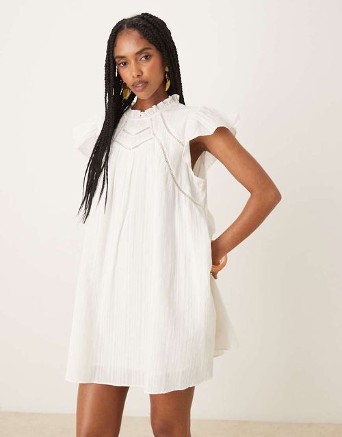 Ruffle sleeve mini smock dress with ladder stitch yoke detail in white