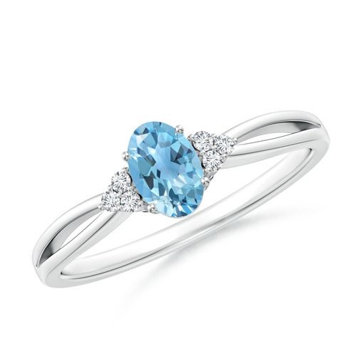 Angara 0.54 Carat Oval Swiss Blue Topaz Split Shank Ring with Trio Diamonds in Platinum