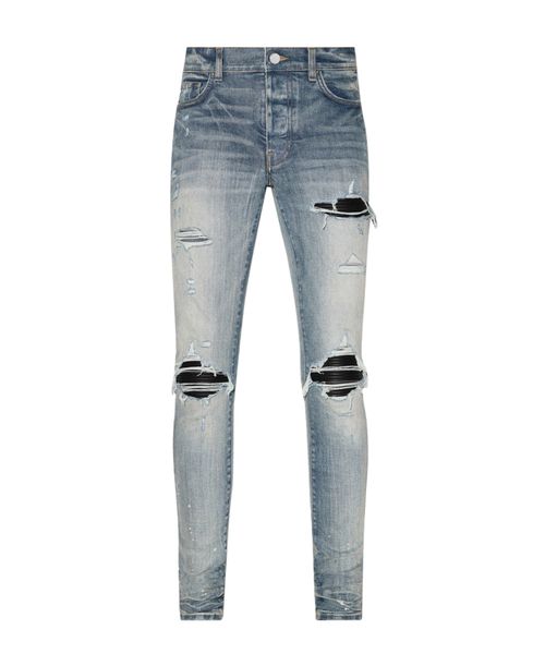 Distressed-finish ripped skinny jeans