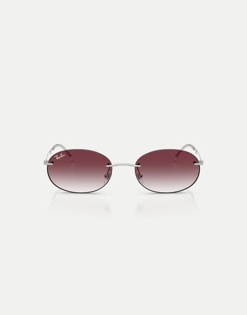 Oval sunglasses with violet lens in silver