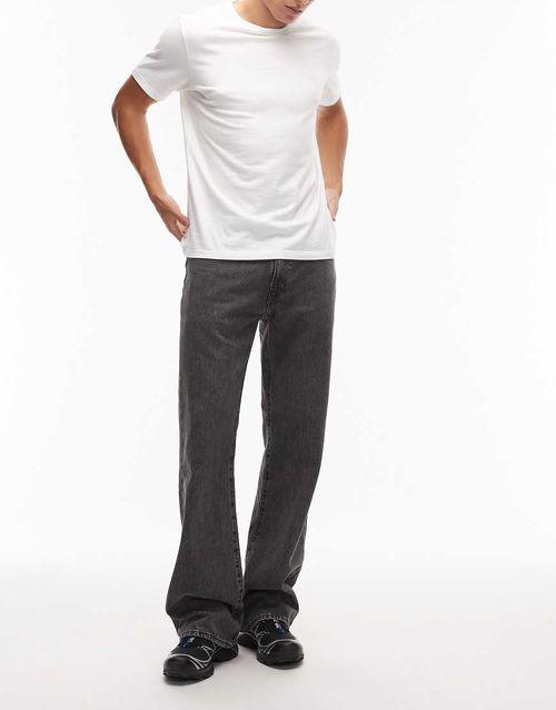 567 relaxed flare fit jeans in washed black