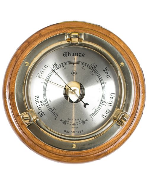 Lacquered Brass Porthole Barometer On Oak Wood