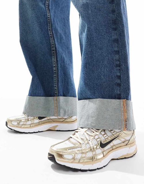 Nike P-6000 trainers in white and gold