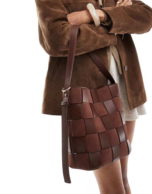 ASOS DESIGN faux suede and faux leather weave bucket tote bag in chocolate-Brown