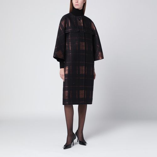 Black cocoon coat in jacquard lamé