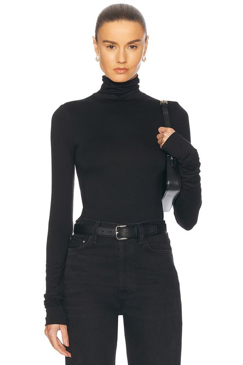 Eterne Fitted Turtleneck Top in Black - Black.  L also in
