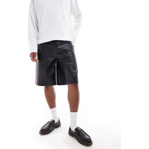 ASOS DESIGN Mens long length faux leather shorts in black - 26 Waist