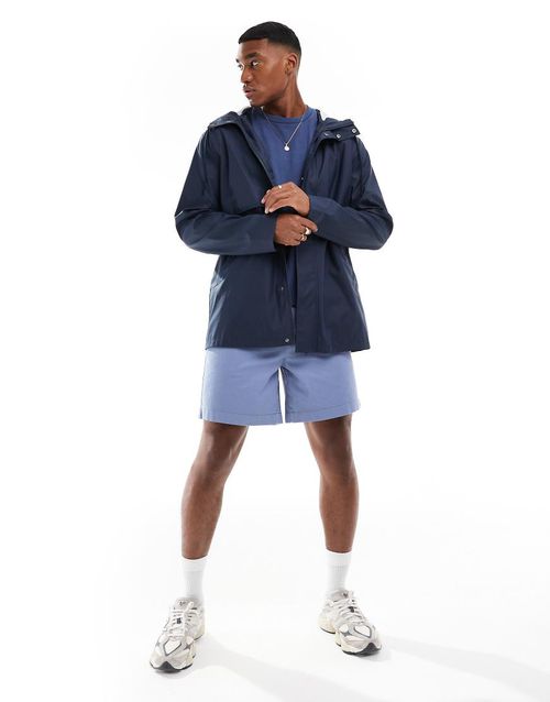 ASOS DESIGN rain resistant rubberized rain jacket in navy