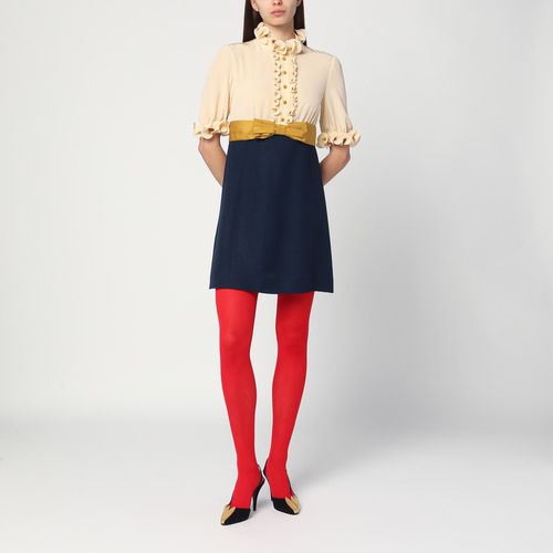 Mini dress with ruffles and bow in silk