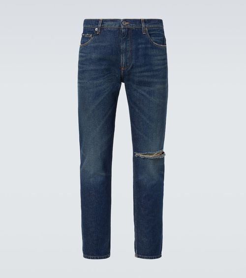 Distressed slim jeans