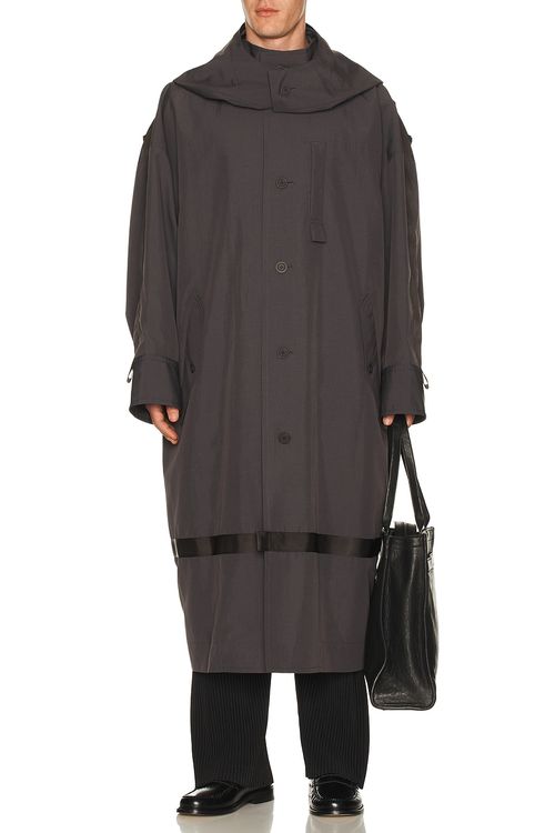 Homme Plisse Issey Miyake Carrier Carried Coat in Charcoal - Charcoal. 3 also in