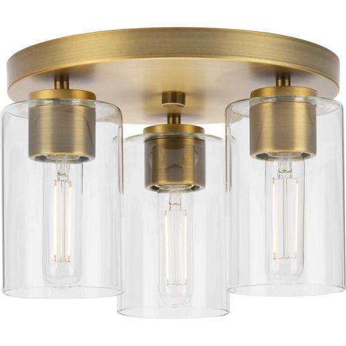 Vintage Brass Three Light Flush Mount from the Cofield Collection