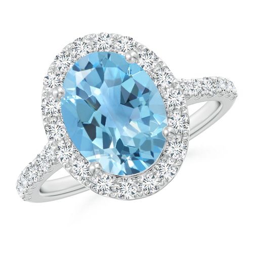 Angara 3.25 Carats Prong-Set Oval Swiss Blue Topaz Halo Ring with Diamonds in Platinum