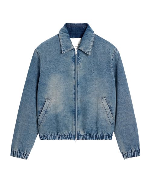 Zipped jacket in used indigo denim.