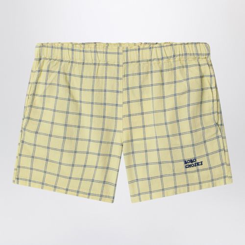 Yellow shorts with check pattern