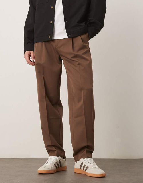 Smart oversized tapered trousers with double pleats in brown