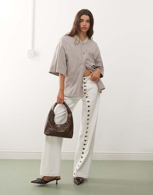 Penny asymmetric button detail wide leg jeans in white