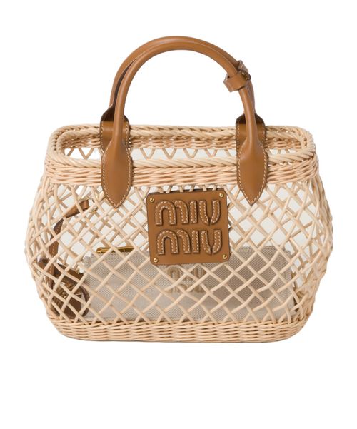 Woven fabric handbag with leather trim