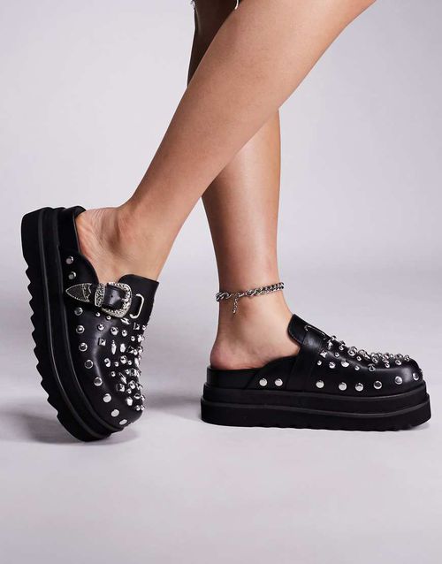 Gabir studded clogs in black faux leather