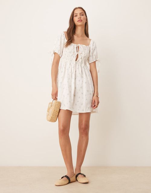 Esmee Exclusive tie front puff sleeve mini beach dress in white ditsy floral
