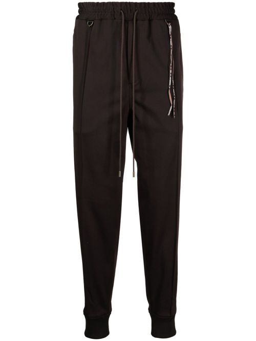 Logo-jacquard tapered track pants - Brown