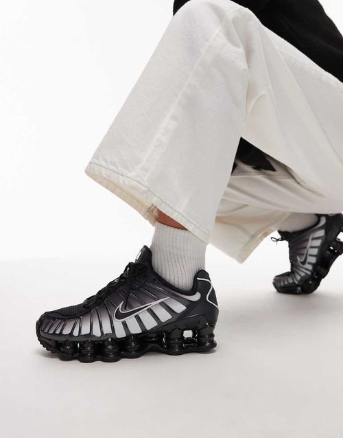 Shox TL trainers in black and white