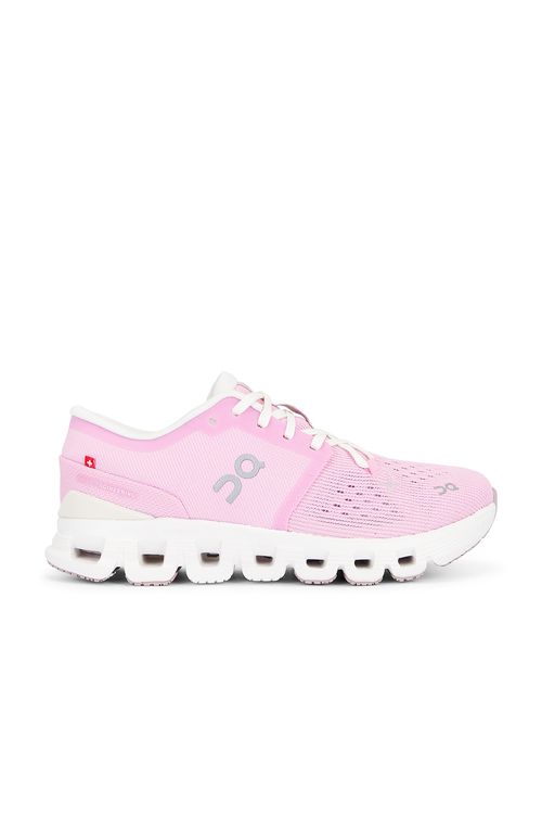 On Cloud X 4 Sneaker in Petal & Sand - Pink.  9.5 also in 10, 5, 5.5, 6, 6.5, 7, 7.5, 8, 8