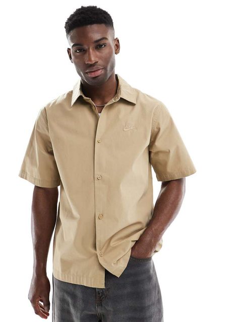 Nike Club short sleeve woven shirt in beige-Navy