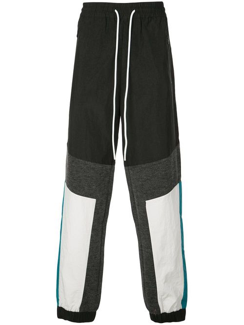 Geometric panelled track pants - Black