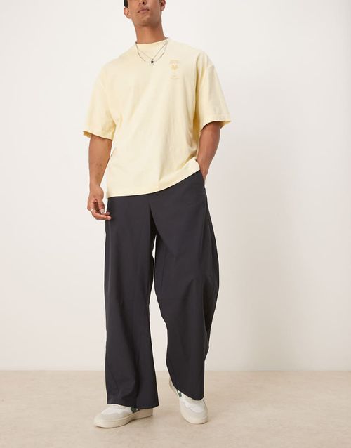 Twisted horseshoe pants in black