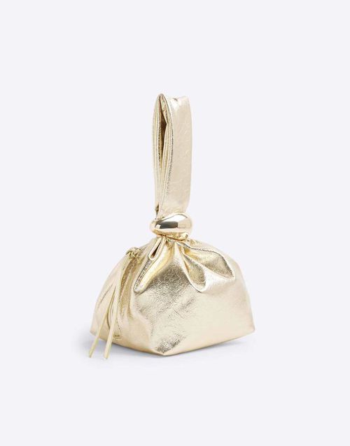 Metal grab bag in gold