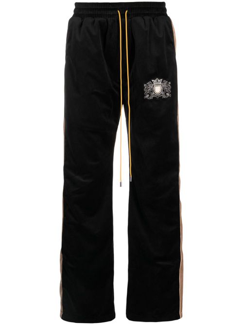 Crest-embroidered velvet track pants - Black