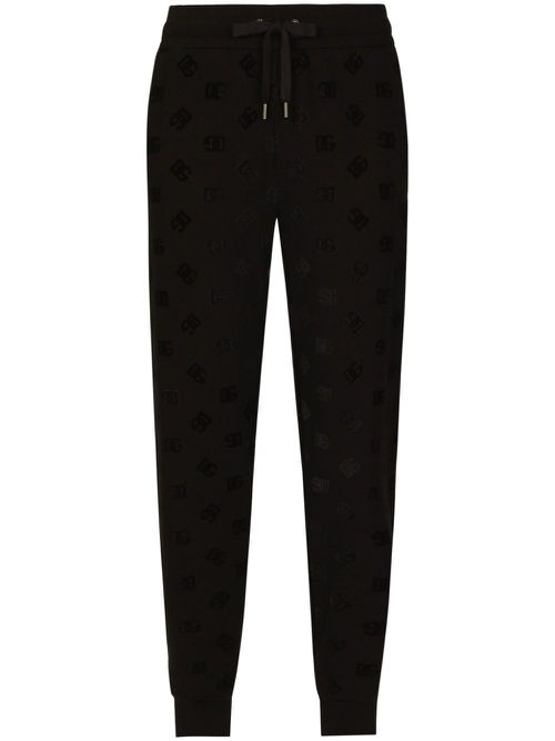 Monogram-embossed cotton track pants - Black