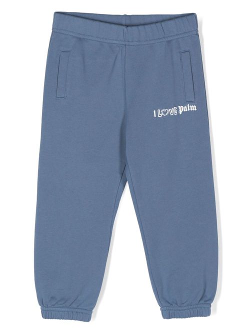 X Keith Haring logo-print track pants - Blue