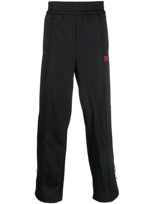 X Haas MoneyGram star-print track pants - Black