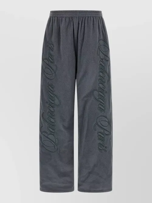 Balenciaga - reversible trousers featuring cursive motif design