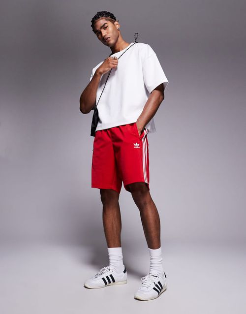Adidas Originals Firebird shorts in red