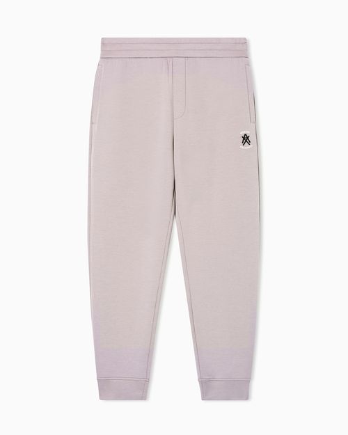 Jogger pants with metal logo