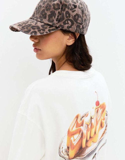 Leopard print cap in brown