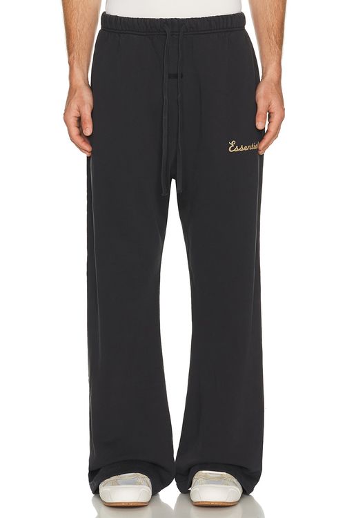 Fear of God ESSENTIALS Training Classic Fit Flare Sweatpant in Faded Black - Black. L also in M, S, XL/1X, XS, XXL/2X